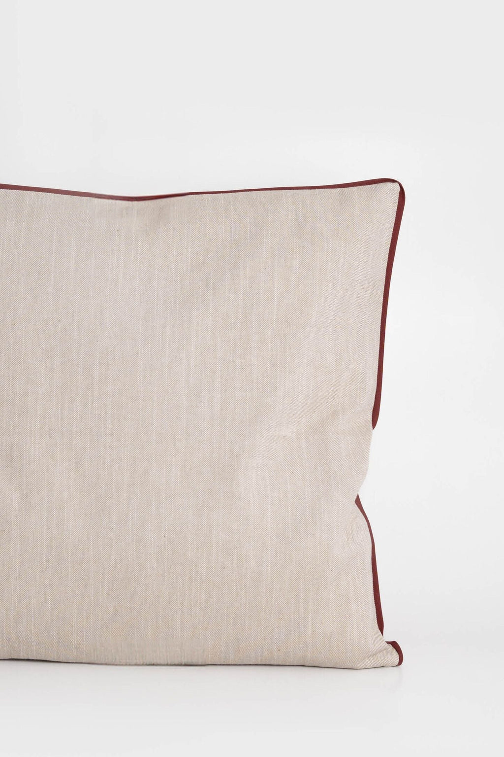 Cotton cushion cover with elegant terracotta border detail, made from soft, durable fabric. Ideal for adding a minimalist and timeless design to your home decor.Made in Portugal.