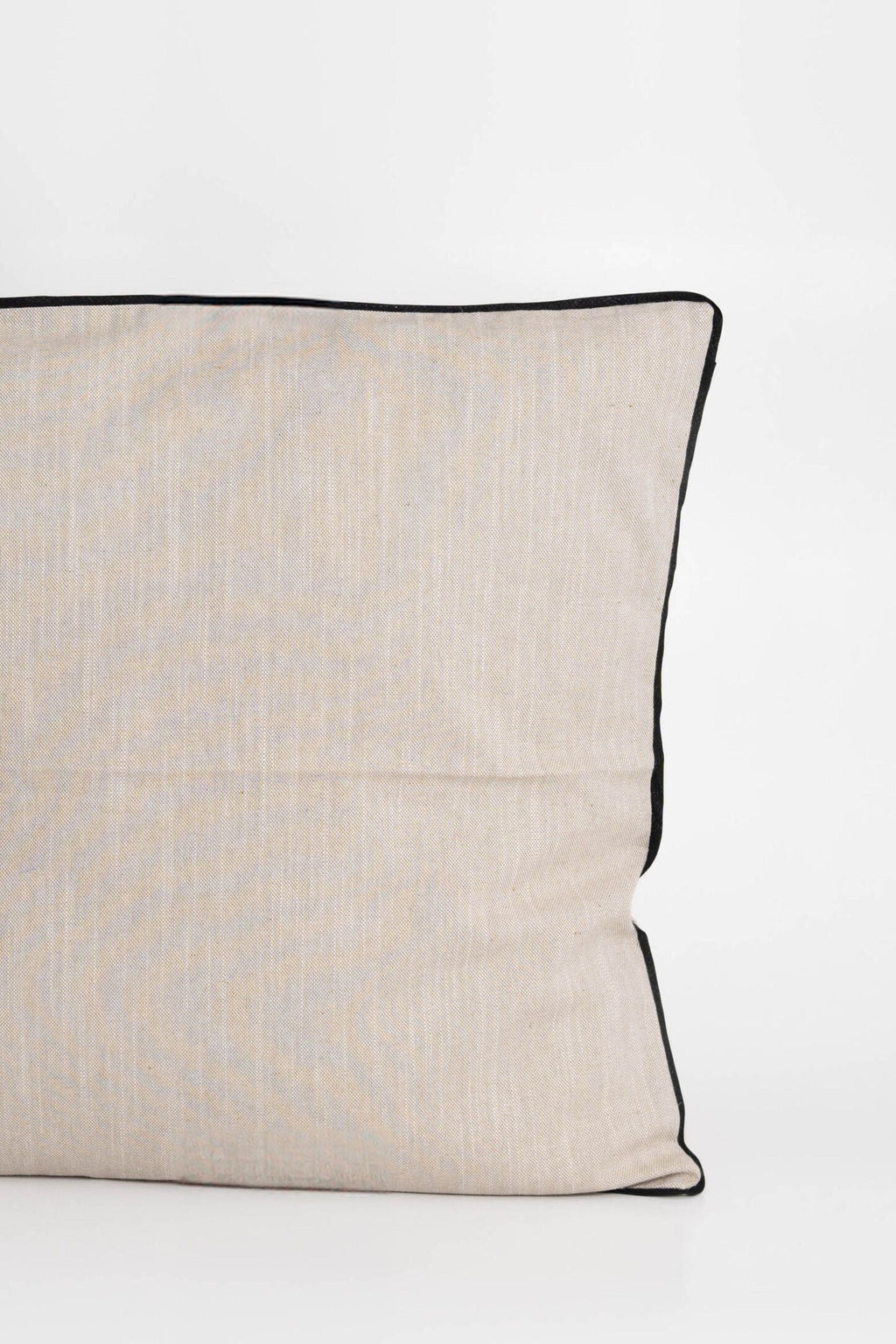 Cotton cushion cover with elegant black border detail, made from soft, durable fabric. Ideal for adding a minimalist and timeless design to your home decor.Made in Portugal.