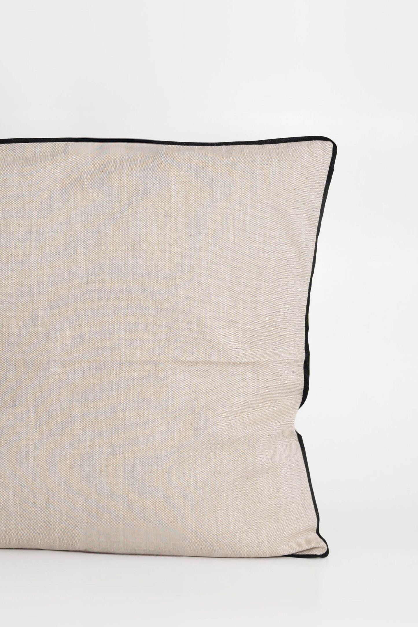 Cotton cushion cover with elegant black border detail, made from soft, durable fabric. Ideal for adding a minimalist and timeless design to your home decor.Made in Portugal.