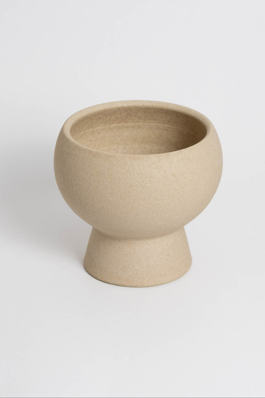 Holden in cream, ceramic vase with a textured, earthy surface, handmade in Portugal. Perfect for displaying flowers or as a unique decorative vase in modern interiors.