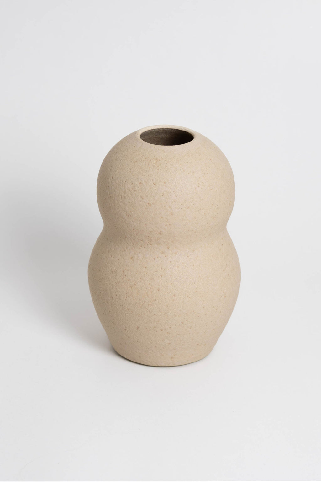 Palus in cream, ceramic vase with a textured, earthy surface, handmade in Portugal. Perfect for displaying flowers or as a unique decorative vase in modern interiors.