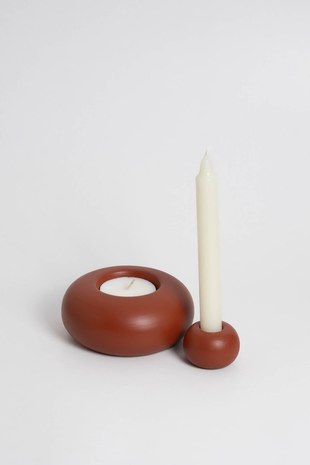 candle holder consisting of twoindividual pieces that can be arranged together or separately, providing customizable decoration options. handmade in Portugal.