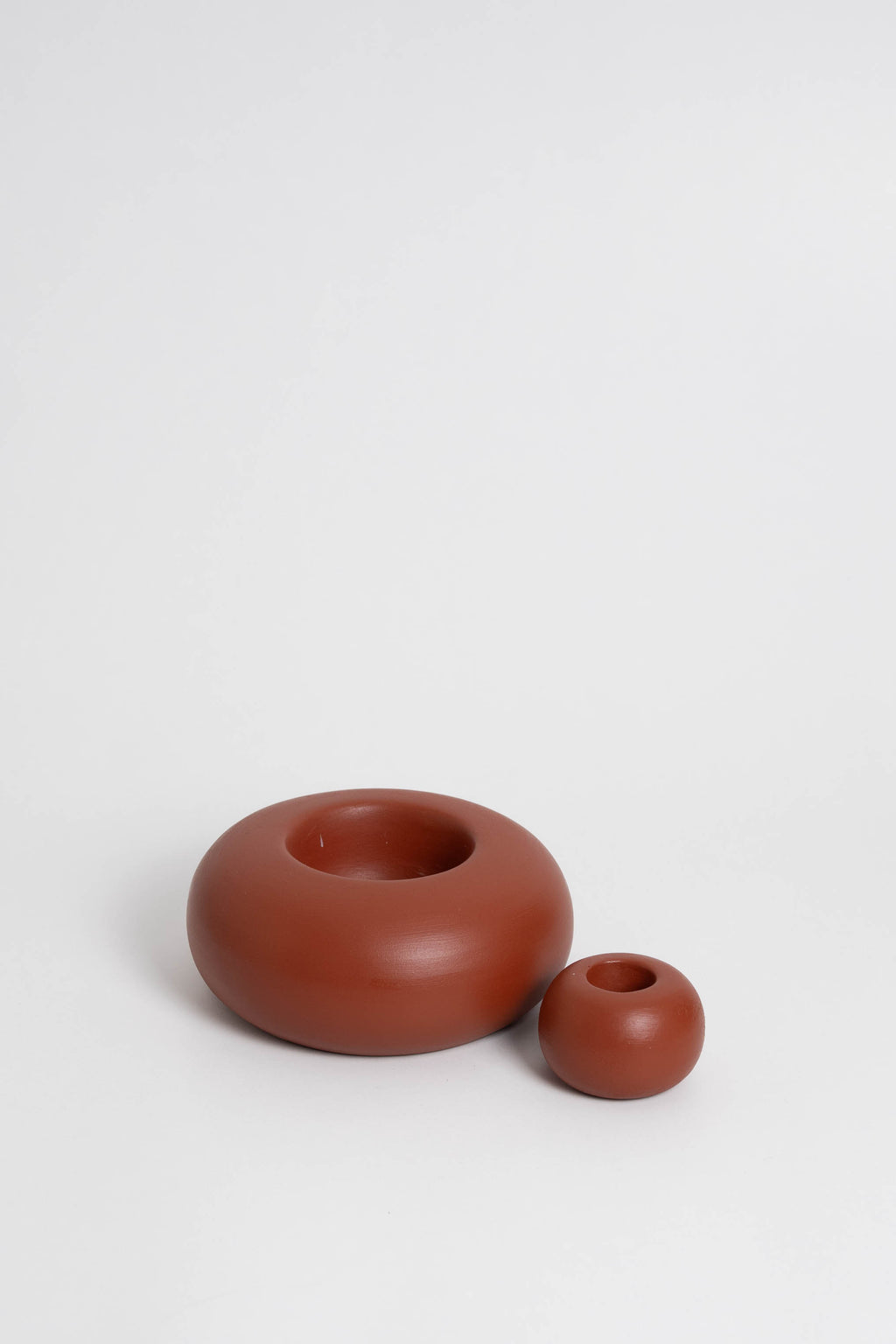 Duo Modular candle holder in terracota, consisting of two individual pieces that can be arranged together or separately, providing customizable decoration options. Handmade in Portugal
