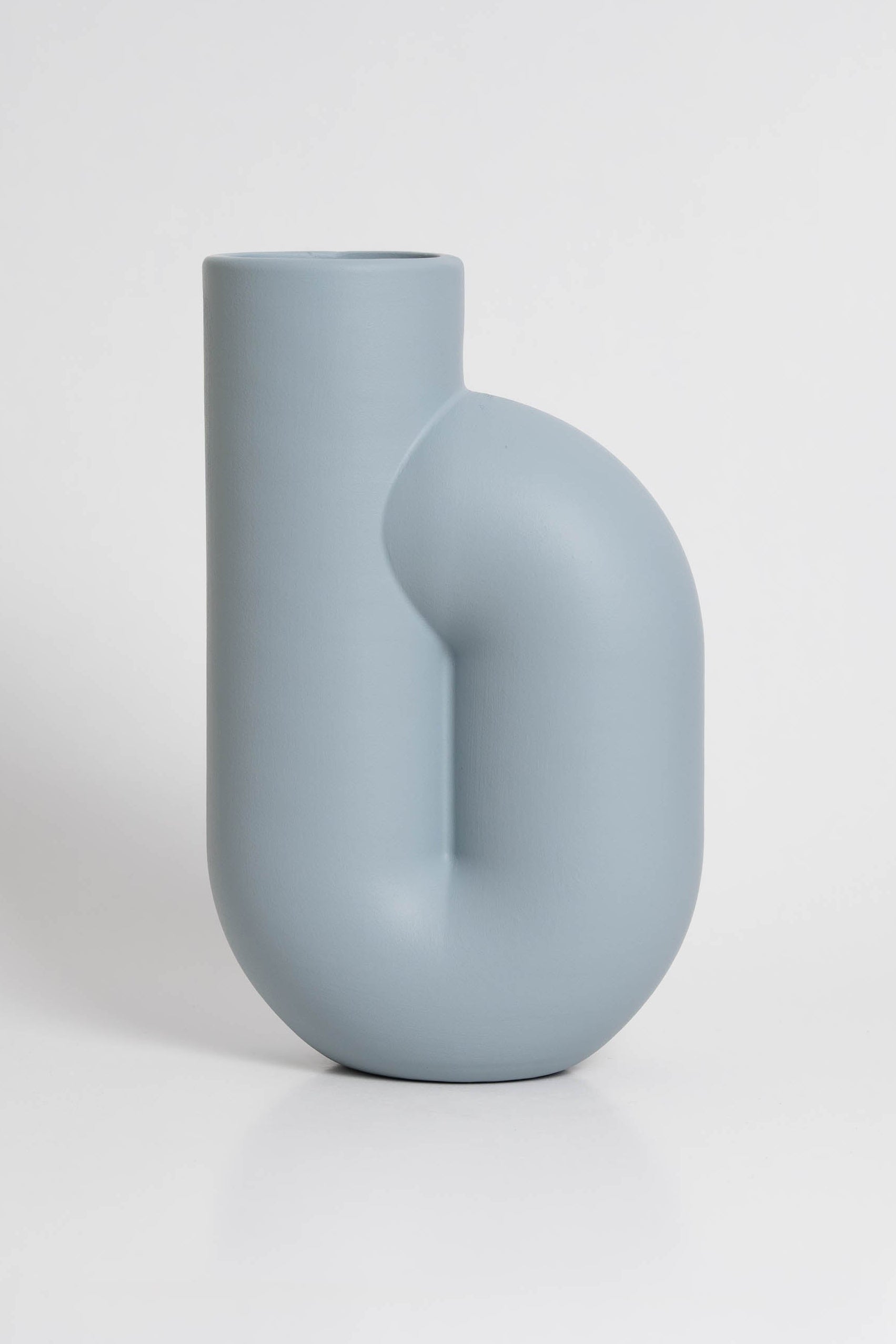 Nono Vase in light bluee ceramic with a minimalist design, handmade in Portugal. Ideal for displaying flowers or as a standalone decorative vase.
