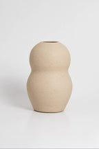 Palus in cream, ceramic vase with a textured, earthy surface, handmade in Portugal. Perfect for displaying flowers or as a unique decorative vase in modern interiors.