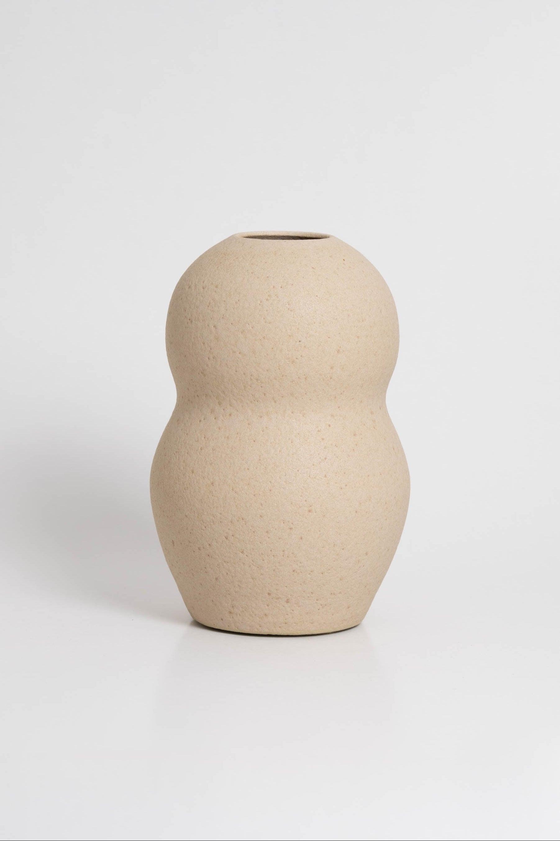 Palus in cream, ceramic vase with a textured, earthy surface, handmade in Portugal. Perfect for displaying flowers or as a unique decorative vase in modern interiors.