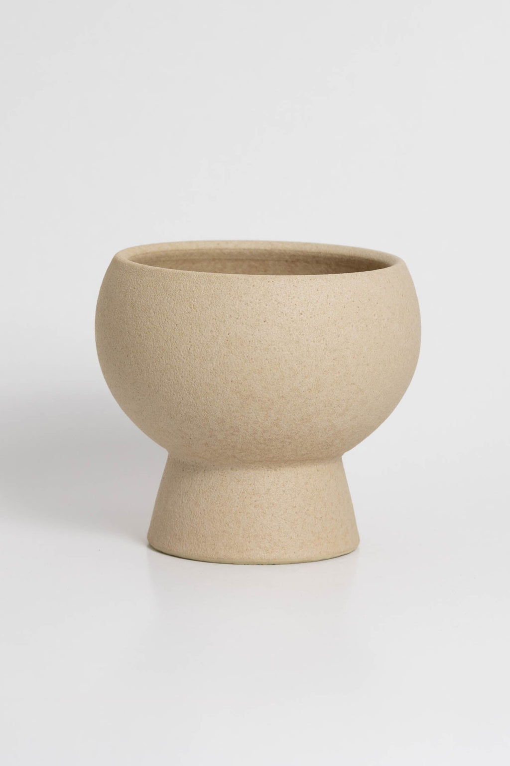 Holden in cream, ceramic vase with a textured, earthy surface, handmade in Portugal. Perfect for displaying flowers or as a unique decorative vase in modern interiors.