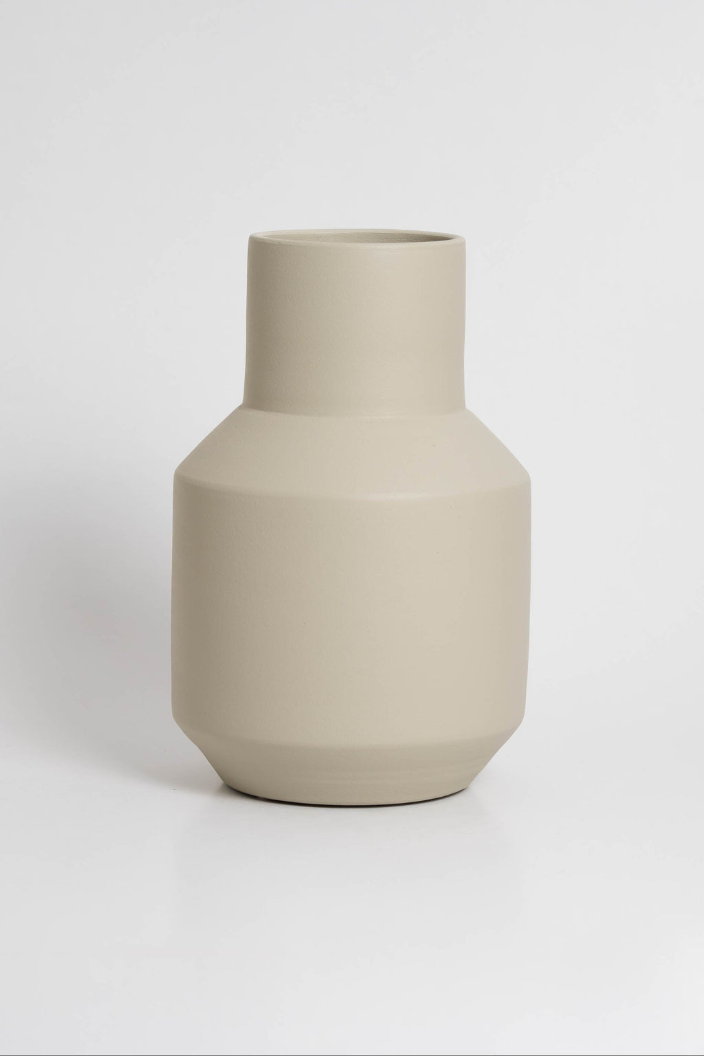 Sado Vase in off white ceramic with a minimalist design, handmade in Portugal. Ideal for displaying flowers or as a standalone decorative vase.