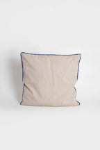 Cotton cushion cover with elegant blue border detail, made from soft, durable fabric. Ideal for adding a minimalist and timeless design to your home decor.Made in Portugal.