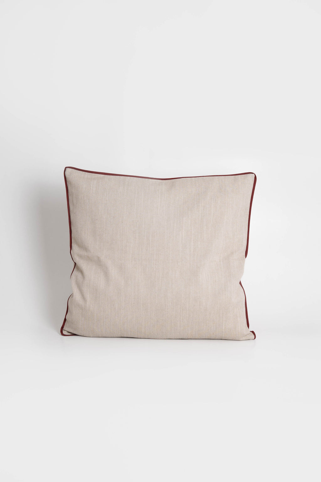 Cotton cushion cover with elegant terracotta border detail, made from soft, durable fabric. Ideal for adding a minimalist and timeless design to your home decor.Made in Portugal.