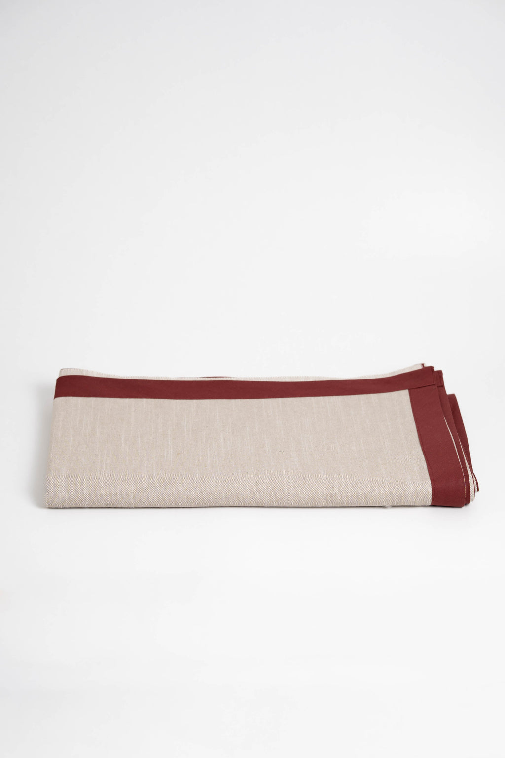 Soft and eco-friendly tablecloth made from cotton, made in Portugal. Features terracotta border detail. Perfect for table decor.