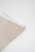 Soft and eco-friendly home textile made from cotton, made in Portugal. Features white border detail. Perfect for table decor.