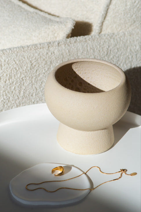 Holden in cream, ceramic vase with a textured, earthy surface, handmade in Portugal. Perfect for displaying flowers or as a unique decorative vase in modern interiors.