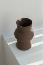 Melas in brown, ceramic vase with a textured, earthy surface, handmade in Portugal. Perfect for displaying flowers or as a unique decorative vase in modern interiors.